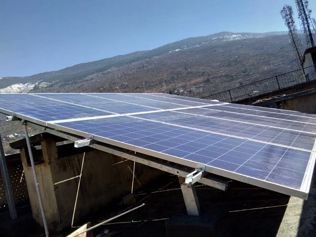 Rooftop solar with valley views at dusk